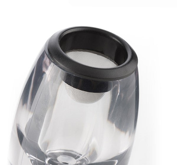 Sleek wine pouring system with elegant decanter design.