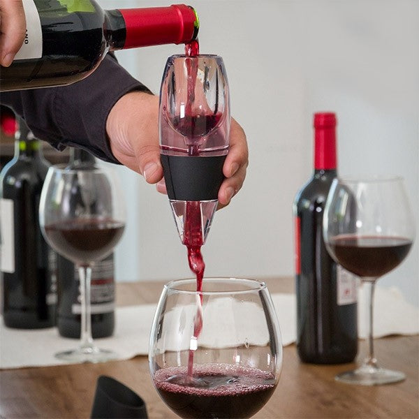 Minimalist wine decanter with sleek design for pouring wine.